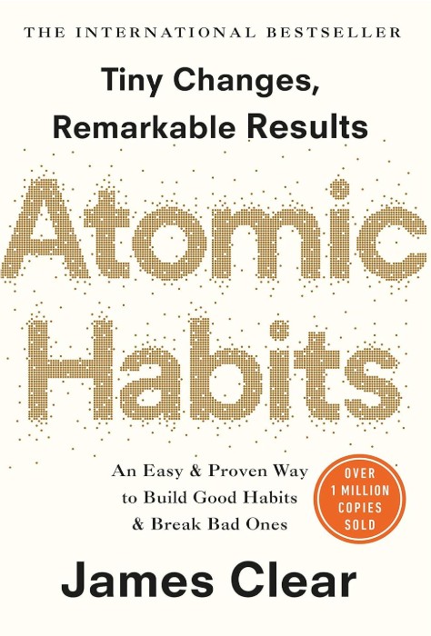 off white book cover with gold dots (atoms) to make up the title - Atomic Habits